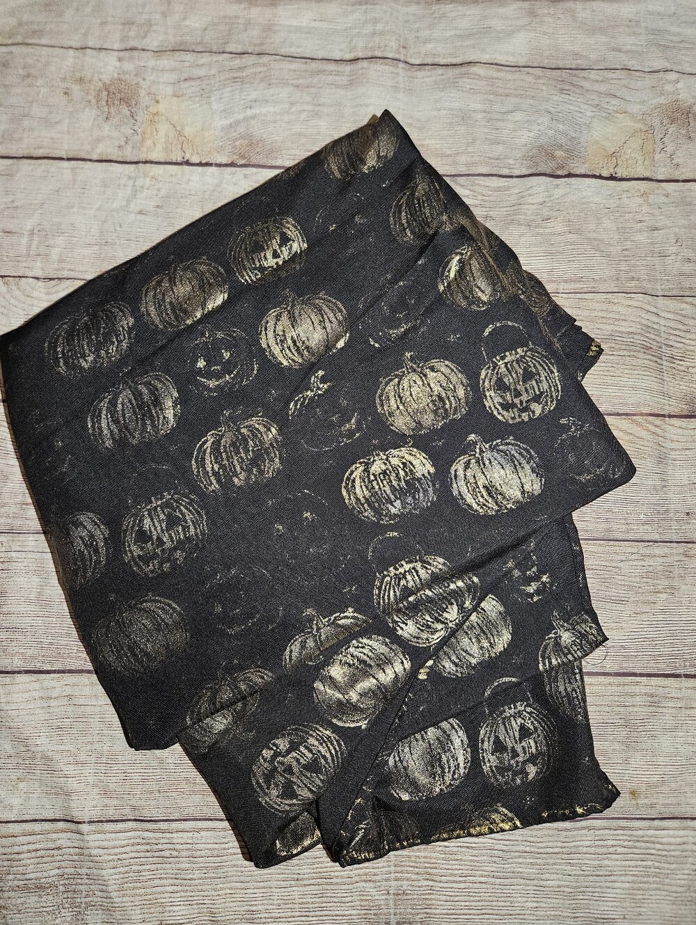 Cynthia Rowely black and gold jack o lantern pumpkins Halloween tablecloth